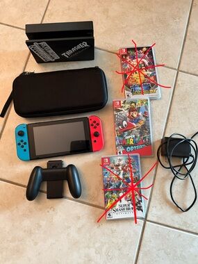 Complete Nintendo Switch system with Red and Blue Joy-Con Controllers